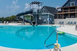 Luxury Lodge Near Lake • Hot Tub, Pools, Firepit & Games