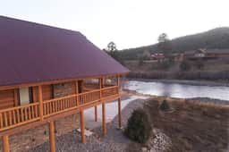 Riverfront Cabin – Cozy Fireplace Retreat - Image 4