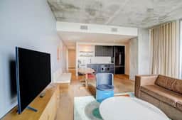 Luxury Rainey Condo • Pool & Gym • Walk to Bars