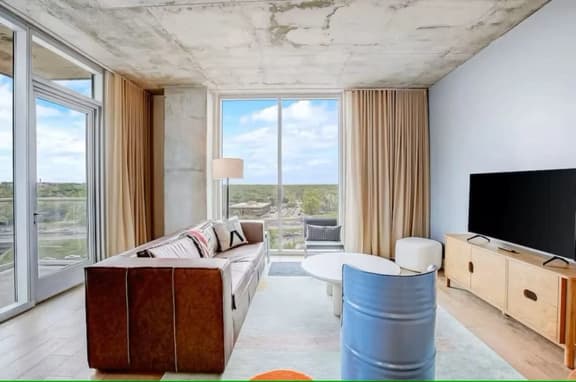 Luxury Rainey Condo • Pool & Gym • Walk to Bars - Image 1